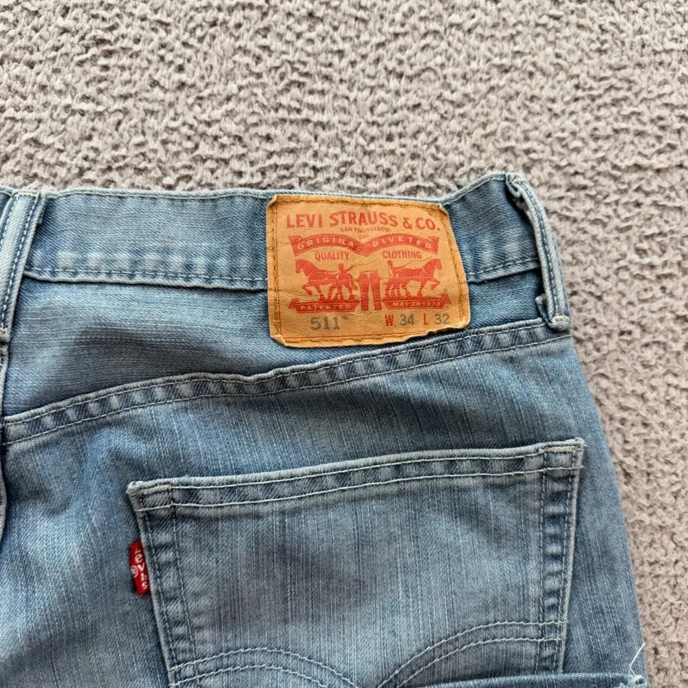 Levi Strauss & Co Mens W34 L32 Light Wash Straight Leg Denim Jeans 04511-0751